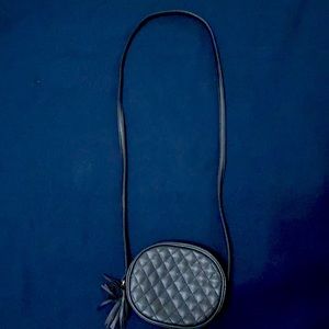 Black purse with strap